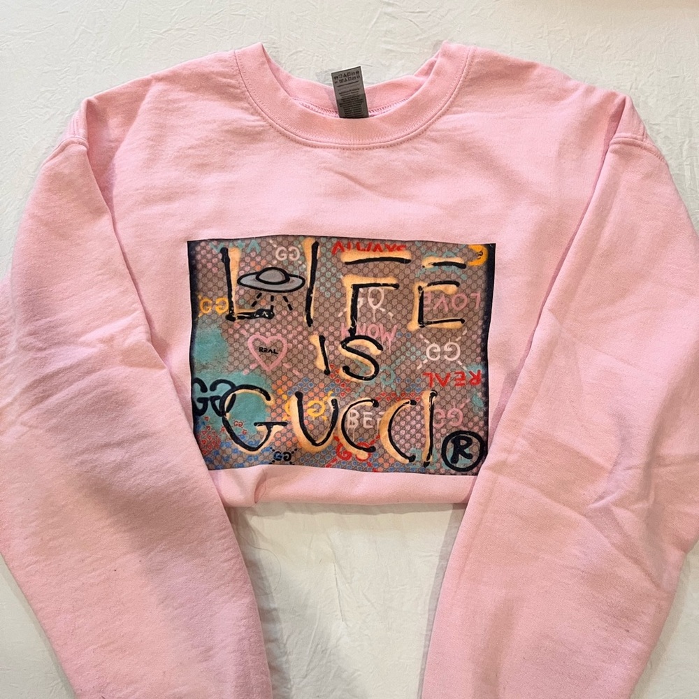 Baby pink crewneck “Life is Gucci”